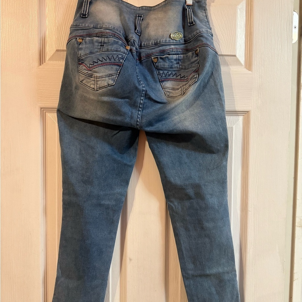 Stylish High-Rise Blue Distressed Jeans - Picture 3 of 4